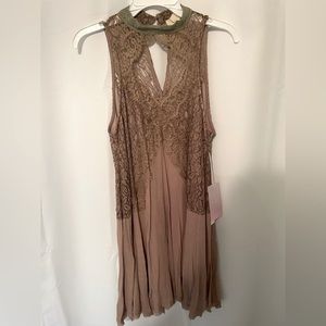 NEVER WORN Free People lookalike dress! Size medium. Beautiful brown color!